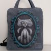 Personalised backpack in recycled leather hand-painted "Aristocratic Cat" aviation colour front view cat design in black and white with turquoise frame