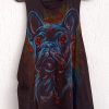 A black vest featuring a hand-painted portrait of a French Bulldog, rendered with artistic brushstrokes in shades of orange, red and light blue, hanging on a wall.